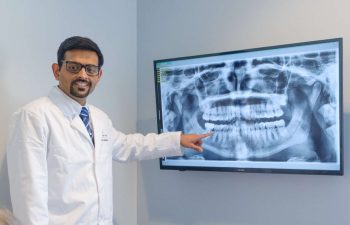 Dr Chokshi with xray panoramic photo.