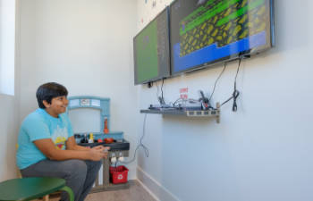 Child playing a video game.
