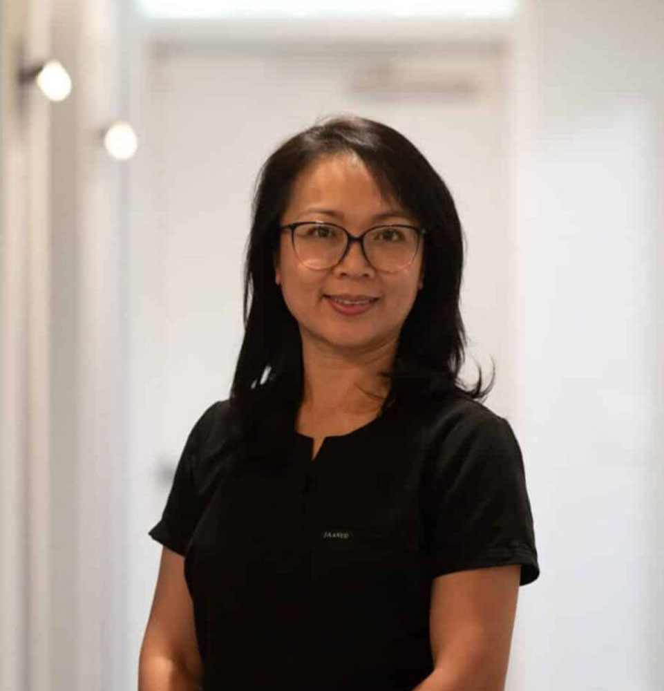 headshot of staff member inside of the dental center