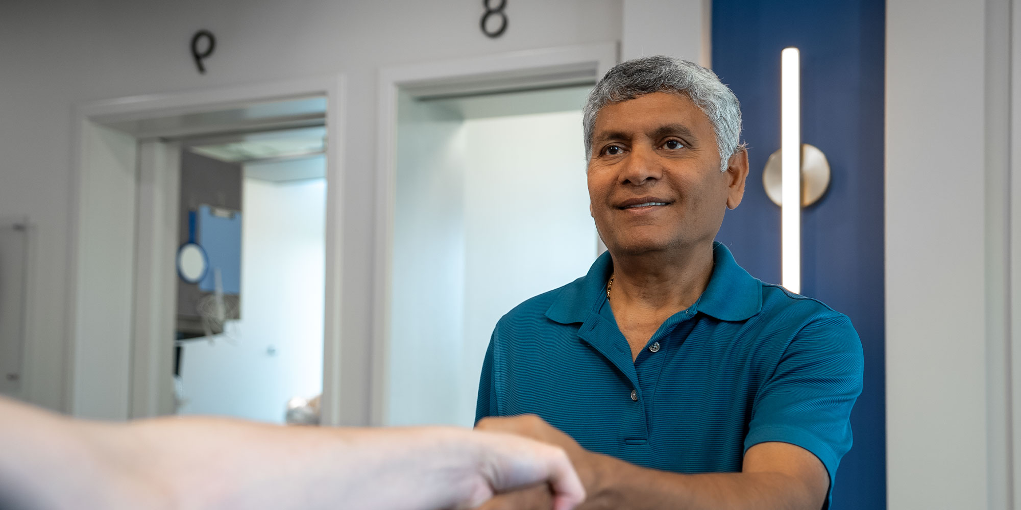 man shaking hands