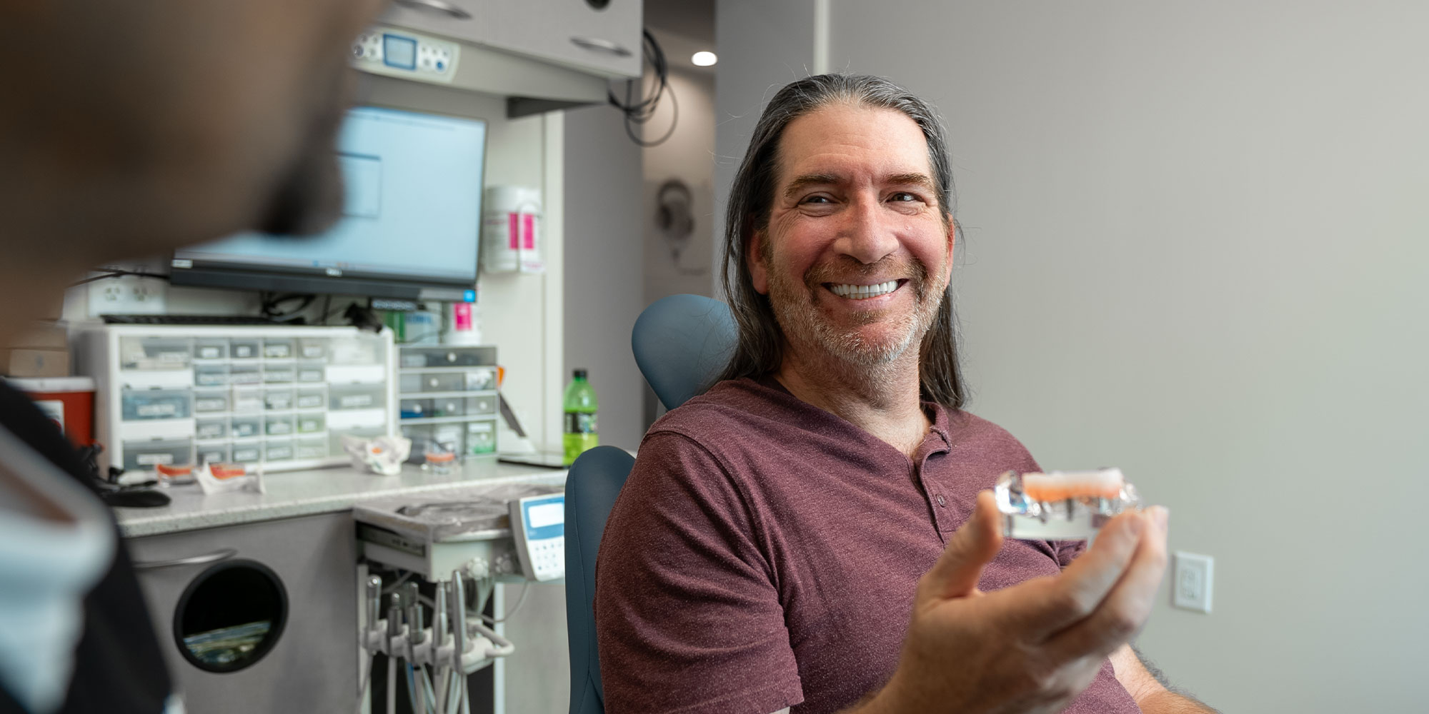 red shirt man oral surgery consult